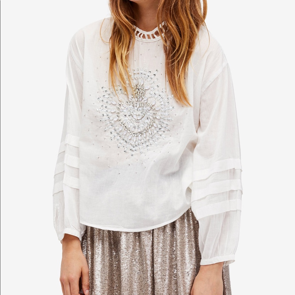 Free people white top.